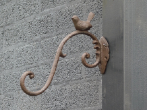 Cast iron hook with bird, brown, very beautiful to behold