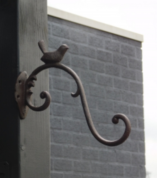 Cast iron hook with bird, brown, very beautiful to behold