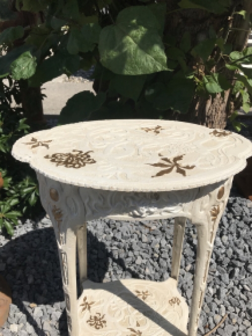 A cast iron table, white, art nouveau ''flower''