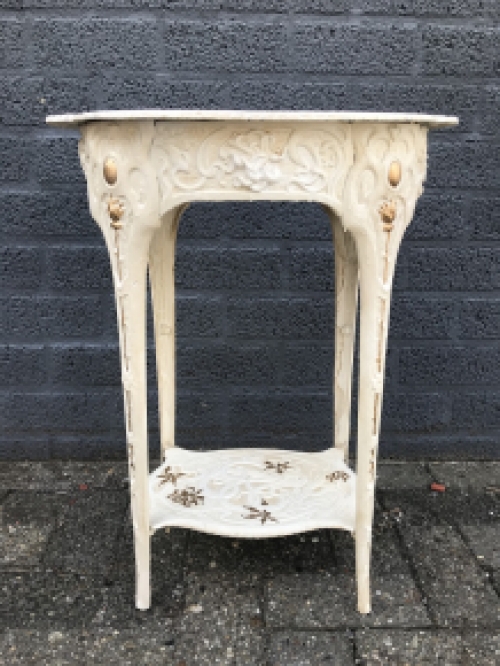 A cast iron table, white, art nouveau ''flower''