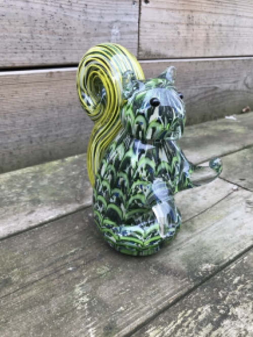 A beautiful glass statue of a squirrel, a glass work of art!