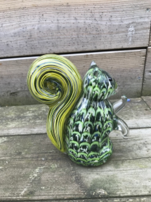 A beautiful glass statue of a squirrel, a glass work of art!