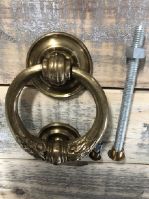 Door knocker, stylish and antique brass.