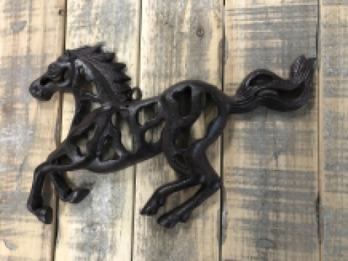 Wall ornament abstract image of a running horse, cast iron brown.