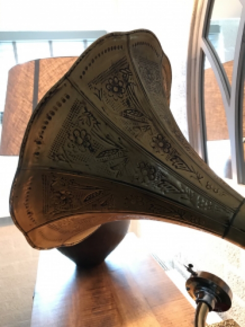 Graceful nostalgic gramophone, record player made of brass and wood