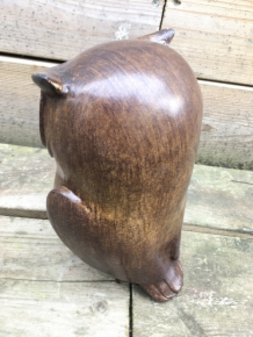 A small owl made of resin, wood appearance, nice figurine!