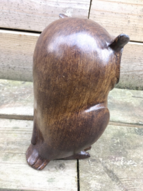 A small owl made of resin, wood appearance, nice figurine!