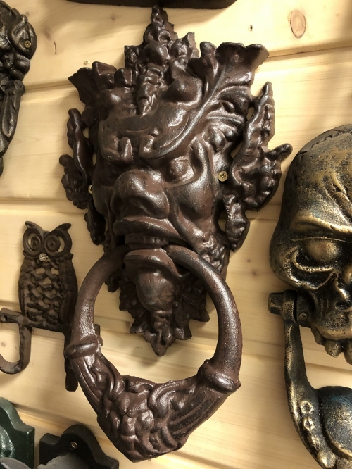 Cast iron door knocker with devil's head-dark brown, very distinctive!