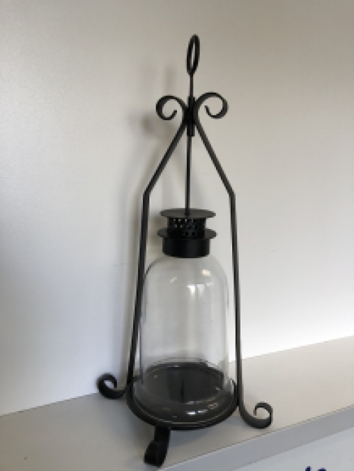 Candlestick, storm lantern, metal-glass, black, beautiful wrought ironwork.