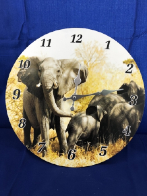 Clock with elephant images, beautiful.