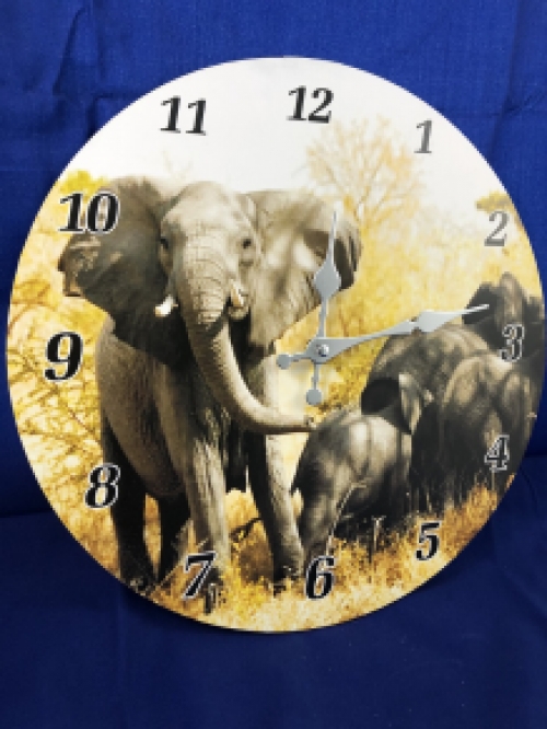 Clock with elephant images, beautiful.