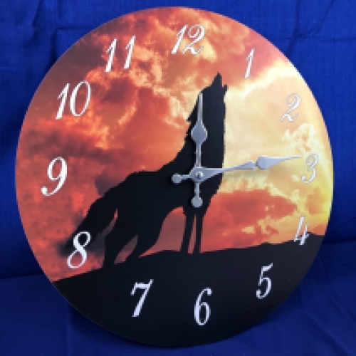 Wooden clock with image of a wolf.