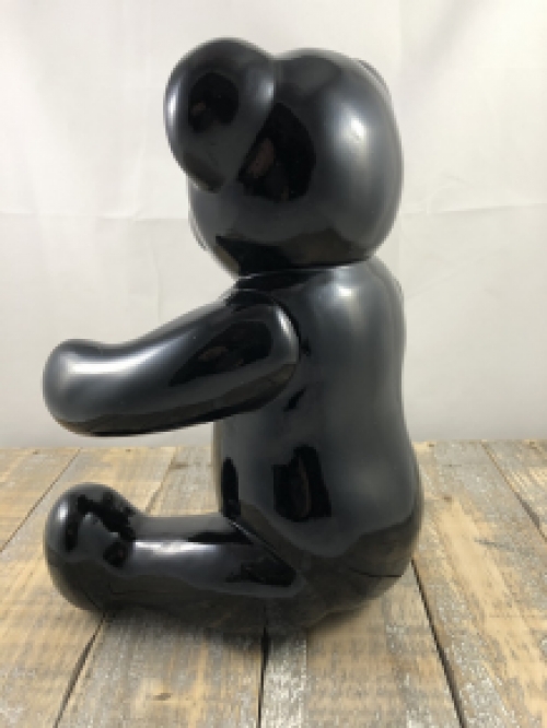 Beautiful black sitting polystone bear.