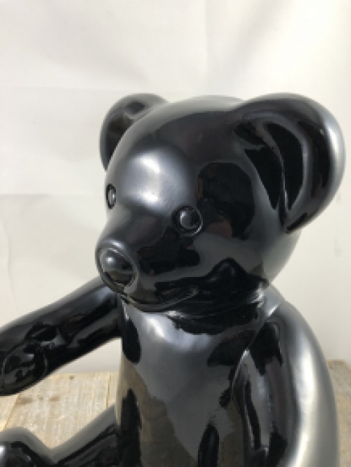 Beautiful black sitting polystone bear.