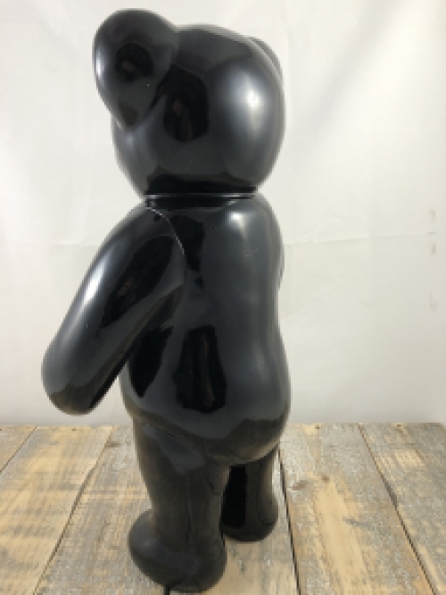 Beautiful black standing polystone bear.