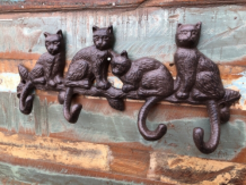 Coat rack with 4 cats and the hooks are the tails, great!