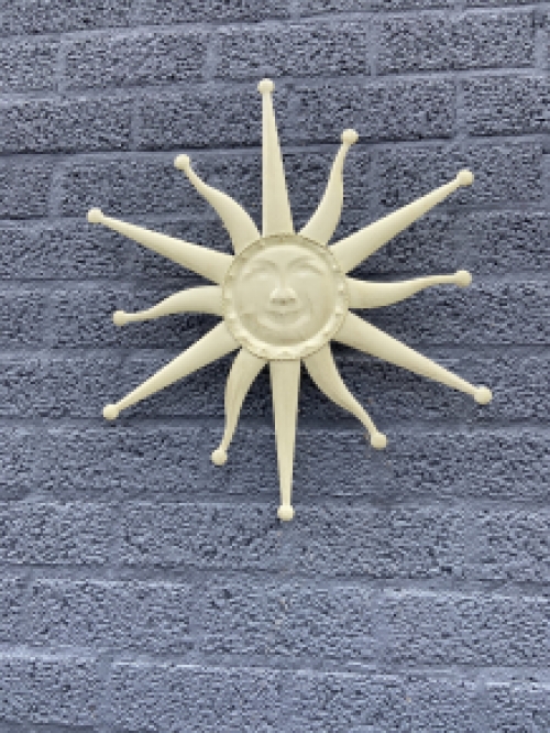 Wall ornament old-white sun, metal.