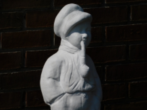 Statue boy with pipe - solid stone