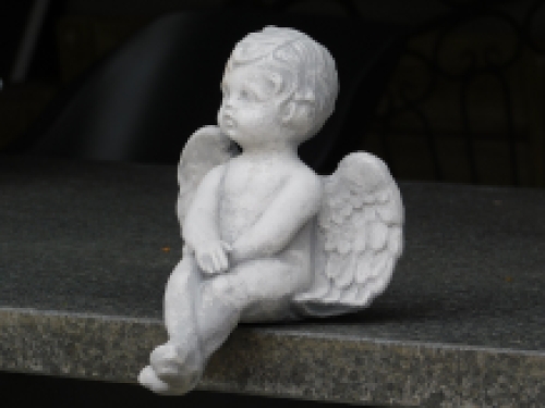 Angel - sitting - full made of stone