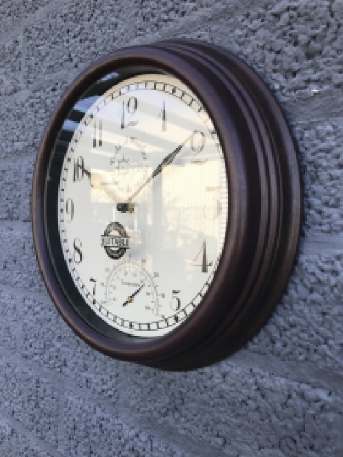 Station clock outdoor clock with thermometer, metal look.