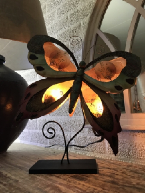 A metal lamp in the shape of a butterfly, very nice!