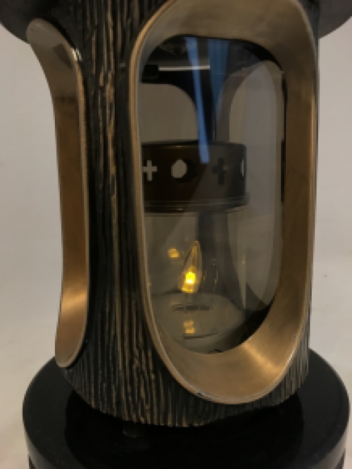 A lantern/grave lamp made entirely of granite with bronze fittings