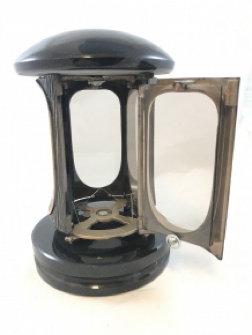 A lantern/grave lamp made entirely of granite with bronze fittings