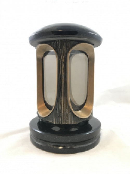 A lantern/grave lamp made entirely of granite with bronze fittings