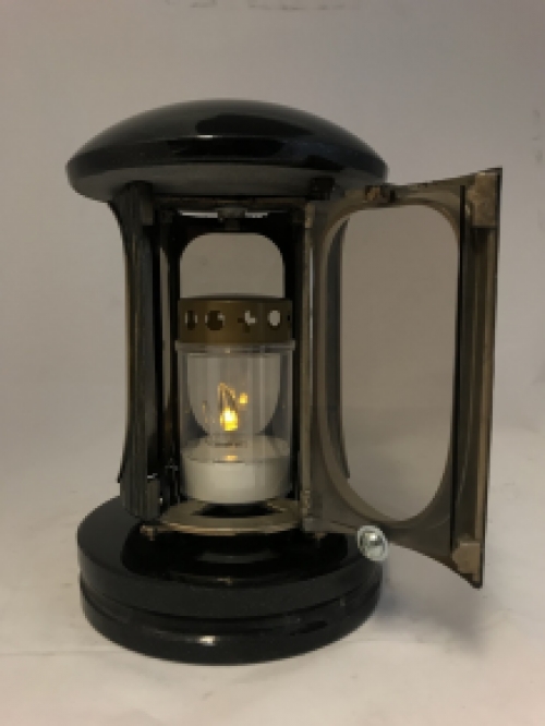 A lantern/grave lamp made entirely of granite with bronze fittings