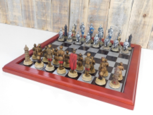 A chess game with the theme: ''MEDIEVAL KNIGHTS'', beautiful chess pieces as medieval knights