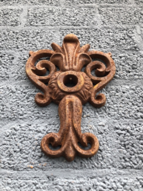 Wall anchor, cast iron, French lily shape.