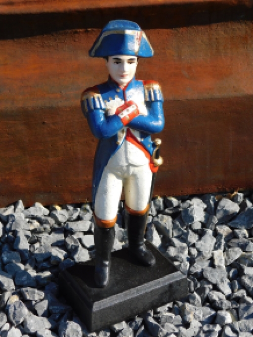 Statue of metal Napoleon in colour.