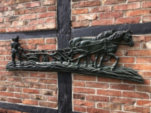 Wall decoration XXL , aluminium green fireplace plate farmer with horse and plough.