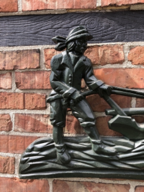 Wall decoration XXL , aluminium green fireplace plate farmer with horse and plough.