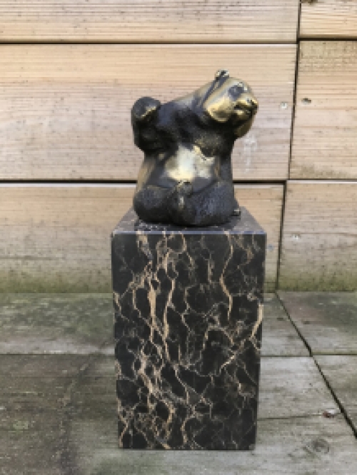 A bronze statue/sculpture of a sitting panda, on a beautiful large base!