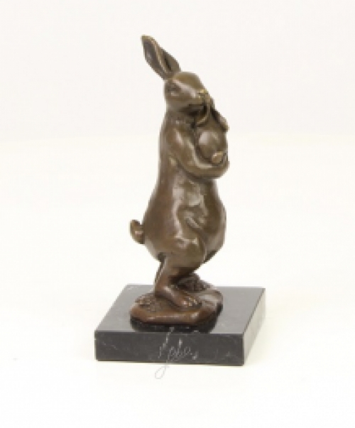 A bronze statue/sculpture of a rabbit with a cub