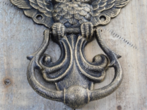 Fantastic door knocker with owl motif, antique bronze.