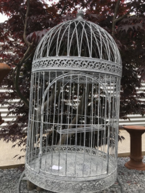 A very pretty decorative birdcage made of iron