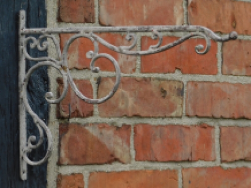 Ornate curved hanging basket wall hook - aged metal