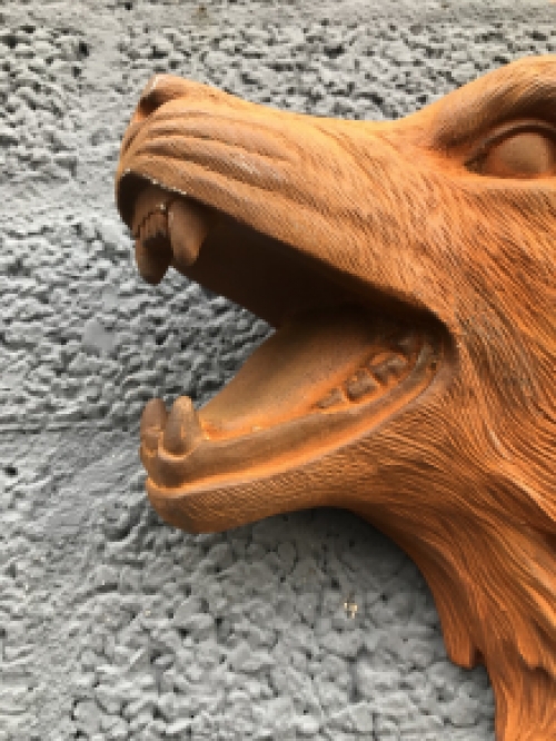 Wolf head, cast iron wall ornament with a rustic surface