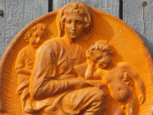 Wall ornament Mary with child - cast iron - rust colour