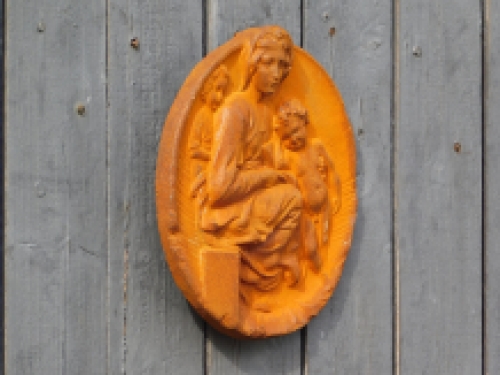 Wall ornament Mary with child - cast iron - rust colour